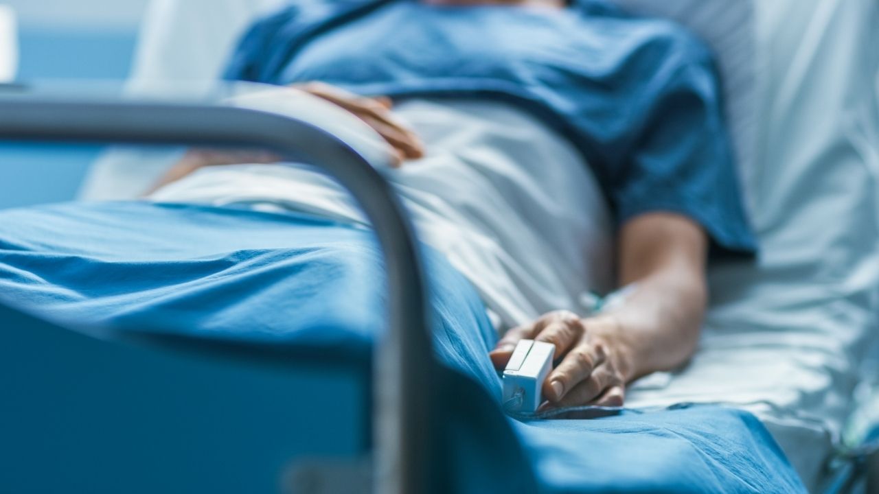 man in a hospital bed
